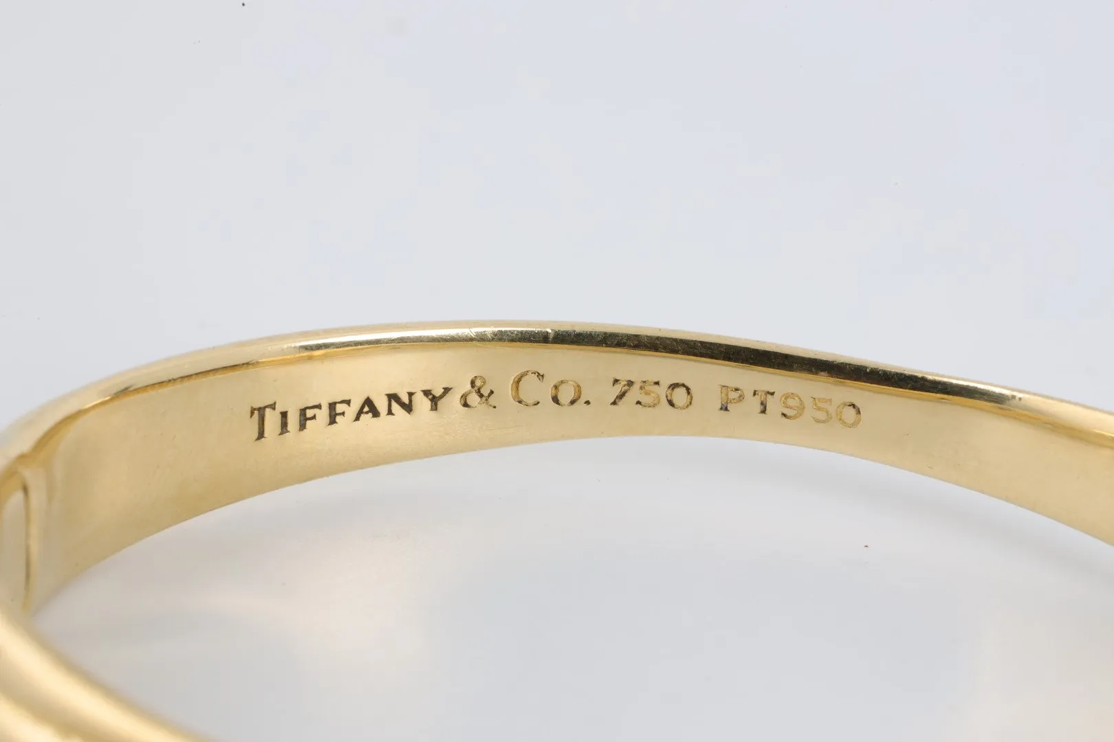 7" Tiffany & Co. 18k Gold Diamond Etoile Crossover Bangle Bracelet (44.12g.)