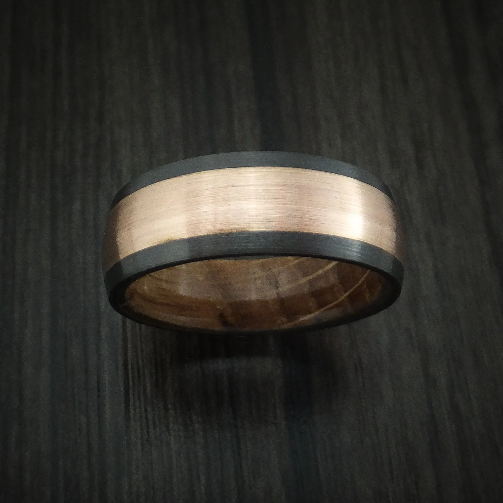 Black Titanium and 14K Rose Gold band with Whiskey Barrel Wood Sleeve Custom Made