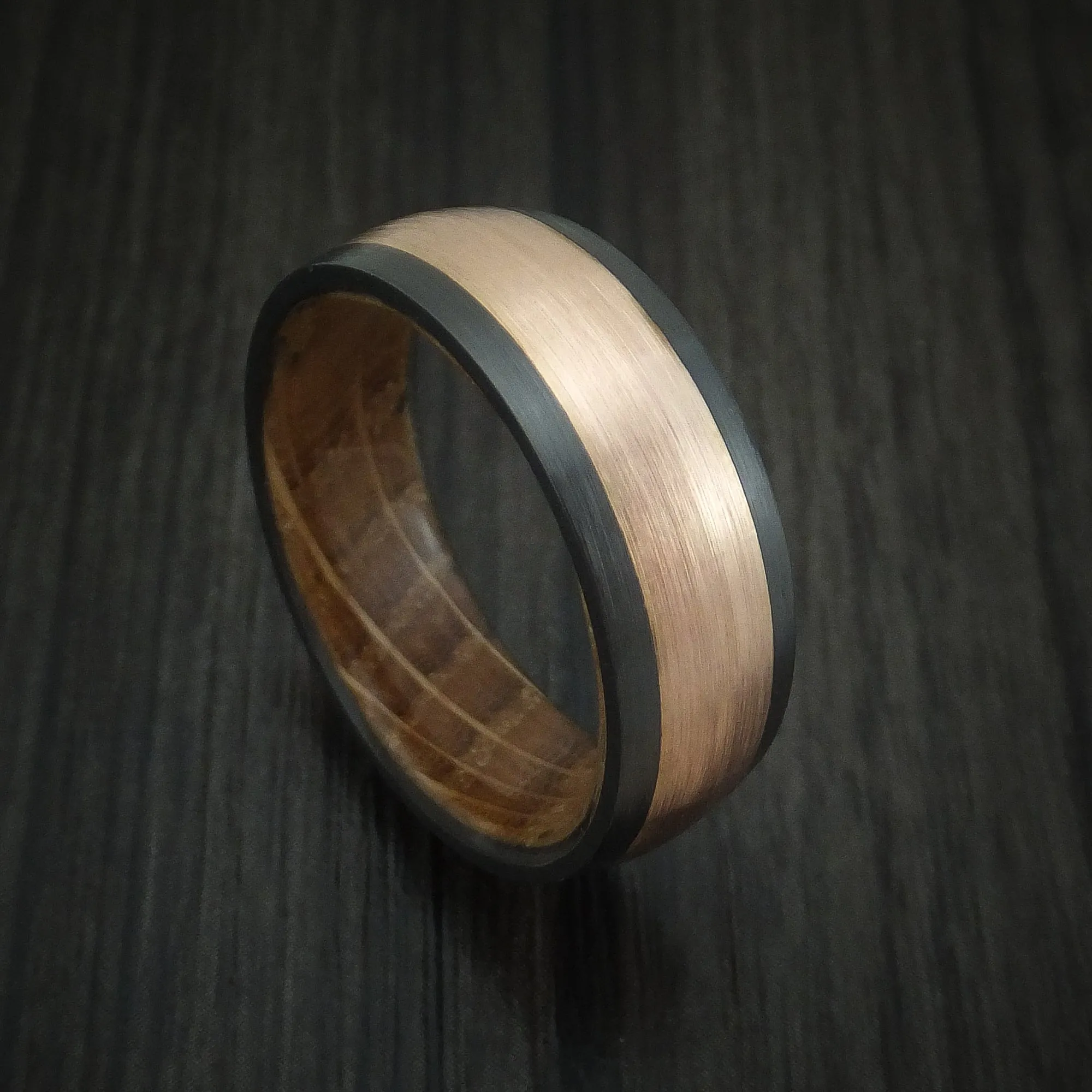 Black Titanium and 14K Rose Gold band with Whiskey Barrel Wood Sleeve Custom Made