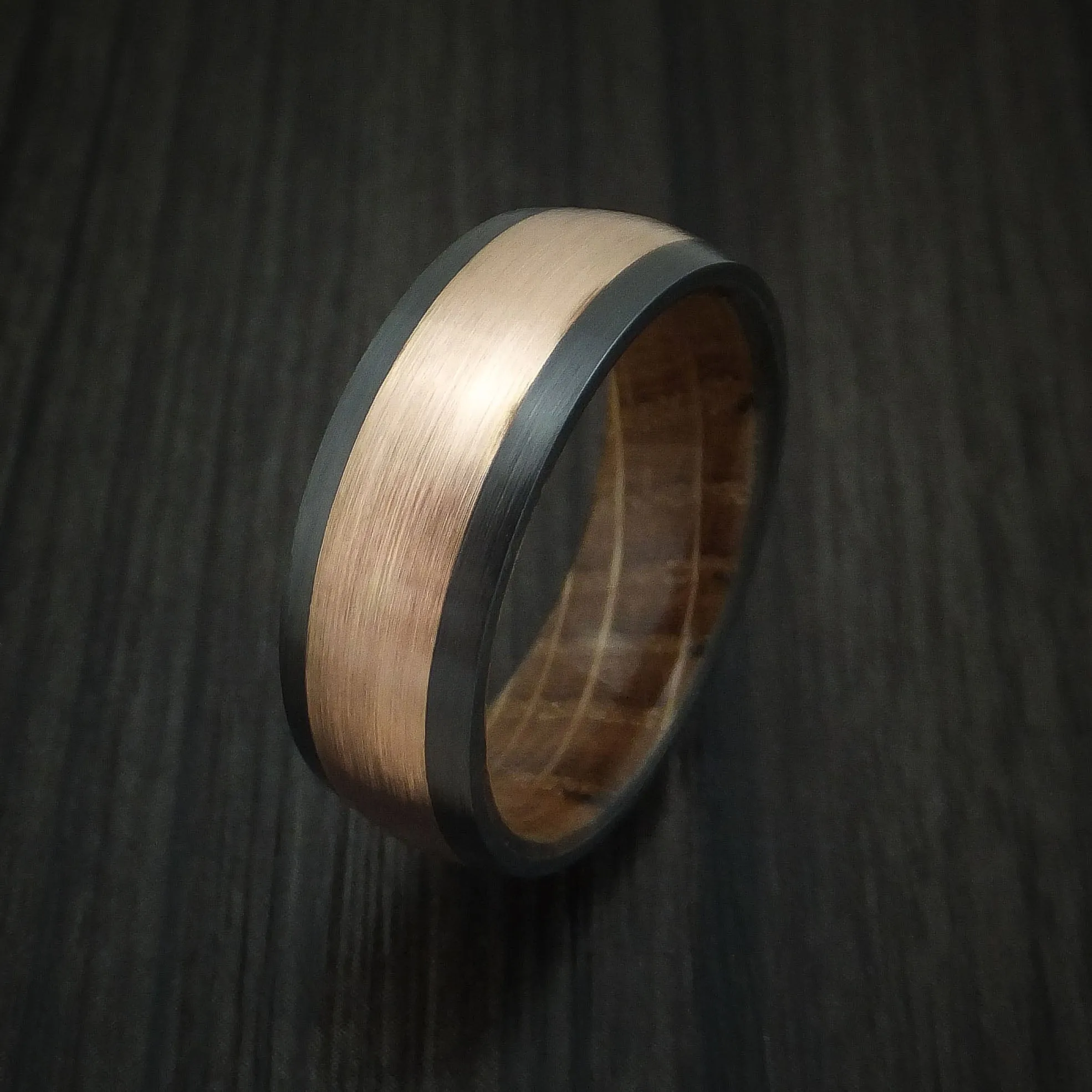 Black Titanium and 14K Rose Gold band with Whiskey Barrel Wood Sleeve Custom Made